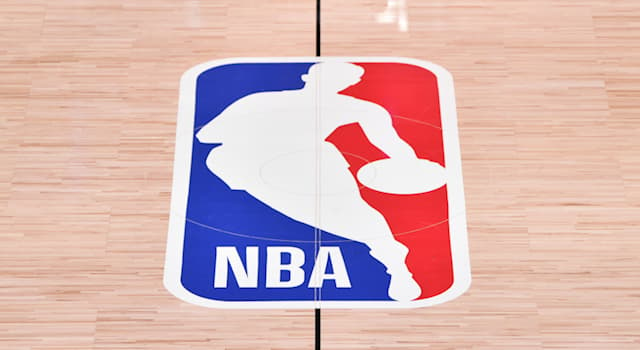 Sport Trivia Question: Who was the first non caucasian to play basketball in what later became the National Basketball Association?