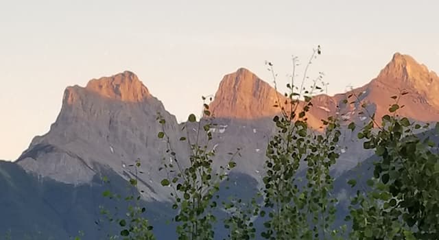 Geography Trivia Question: In what country would you find the "Three Sisters" mountain peaks?