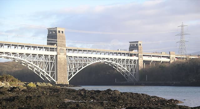Geography Trivia Question: The Britannia Bridge carries the A55 North Wales Expressway and a railway line over which strait?