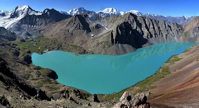Geography Trivia Question: In which region is the Tian Shan, a large system of mountain ranges, located?