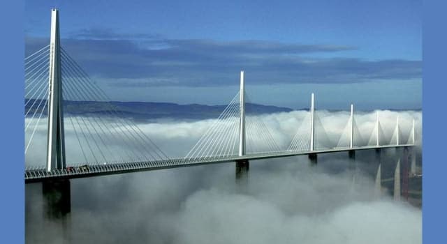 Culture Trivia Question: What is the height of the deck (roadway) of the Millau Viaduct above the Tarn river in France?
