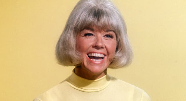Movies & TV Trivia Question: What is considered Doris Day's signature song?