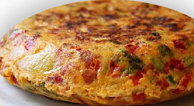 Culture Trivia Question: What unusual ingredients has Tortilla del Sacromonte (Sacromonte omelette)?