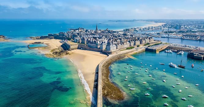 Geography Trivia Question: Which Breton port in France is connected to the UK by ferry services to Poole and Portsmouth?