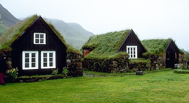 Society Trivia Question: In which country are turf houses depicted in the picture common?