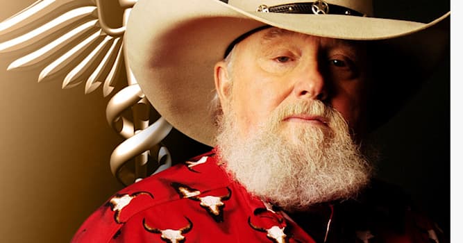 Culture Trivia Question: Who is the country music icon in the photo?