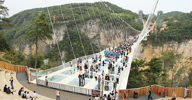 Geography Trivia Question: As of 2021, which is the longest and highest glass bridge in the world?