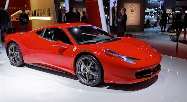 Sport Trivia Vraag: Wat is de naam en het model van de auto op de foto?