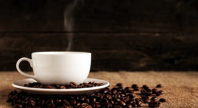 Società Domande: Che tipo di droga è la caffeina?
