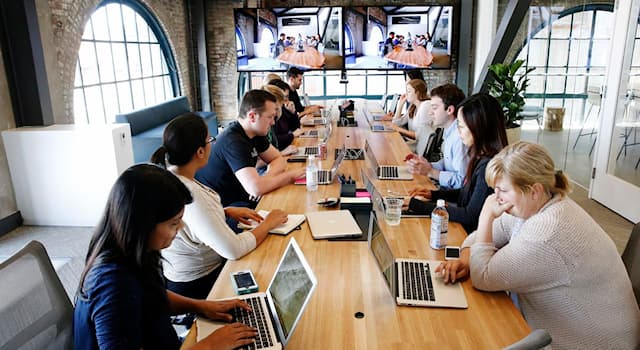 Society Trivia Question: Presenteeism is the practise of doing what at work?