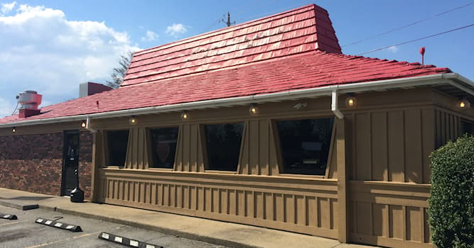 Maatschappij Trivia Vraag: Van welke fastfoodketen is dit een verlaten vestiging?