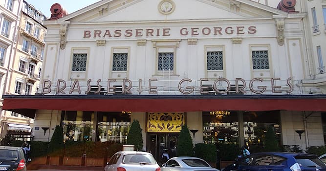 Aardrijkskunde Trivia Vraag: Waar bevindt zich Brasserie George, een van de oudste en grootste brasseries ter wereld?